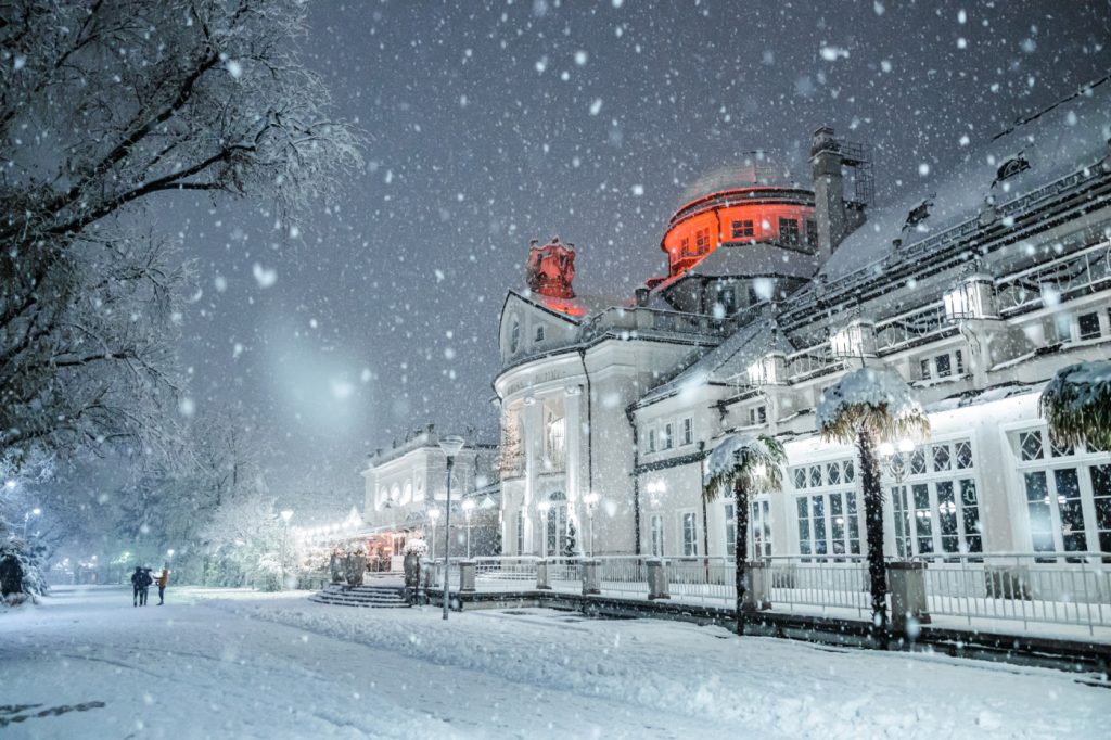 A front of a building in snowy weather.