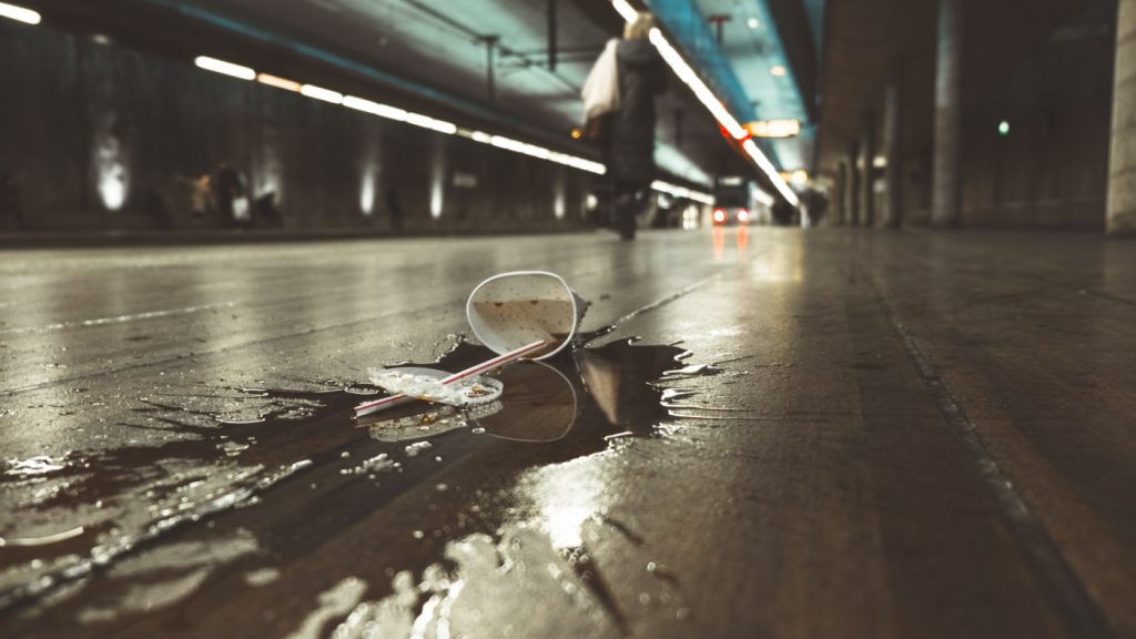 A paper cup spilled on the road.