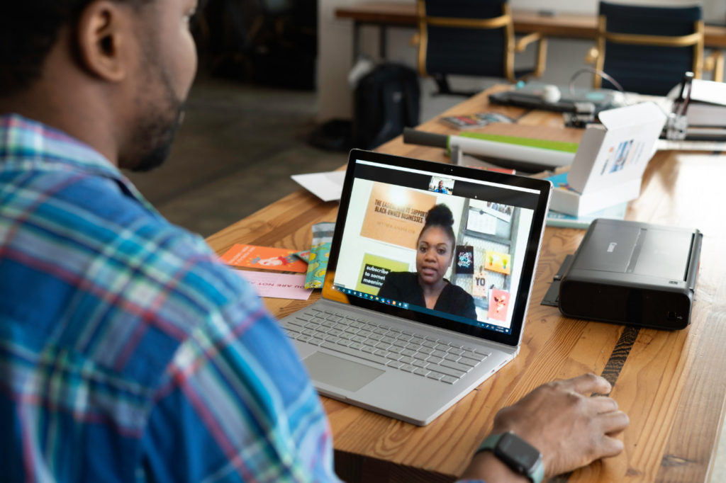 A person taking an online course on a laptop.