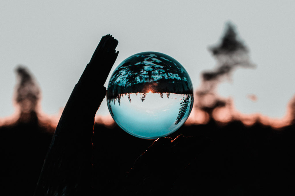 A lens ball that distorts the scenery in the background.