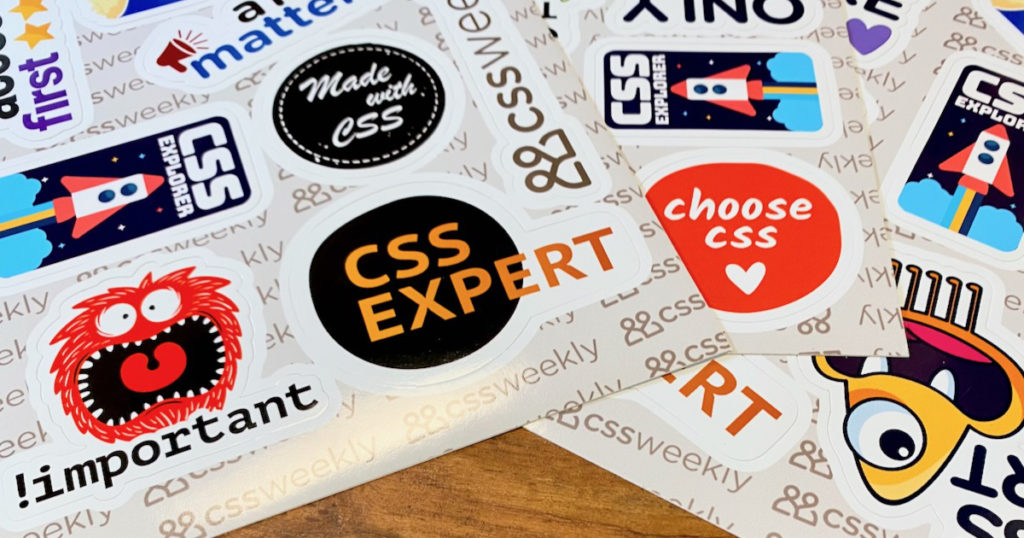 A number of CSS Stickers sheets on a desk.